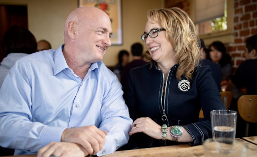 Photo of Mark and Gabby smiling.