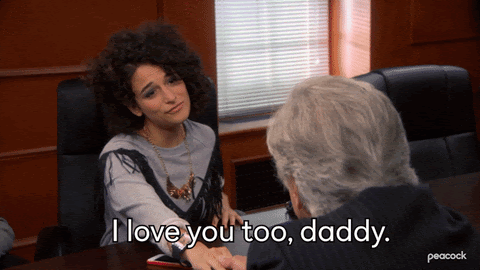 A gif of a woman saying 'I love you too, daddy. Money, please!' to an elderly man