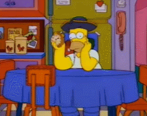Gif of Homer Simpson sitting in his kitchen and sadly staring at a clock Gif of Homer Simpson sitting in his kitchen and sadly staring at a clock