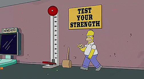 Gif of Homer Simpson sitting on a 'test your strength' fair game