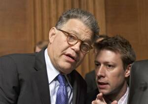 Image of Josh Riley and Al Franken talking