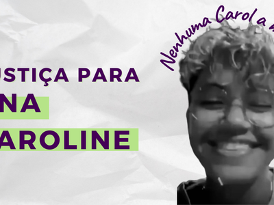 papel massado com os dizeres justiça por ana caroline, com a foto de carol ao lado com a legenda nenhuma carol a menos