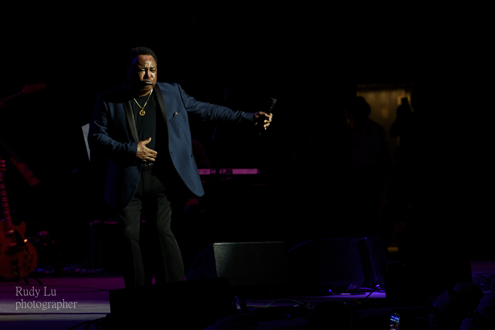 George Benson dancing across the stage