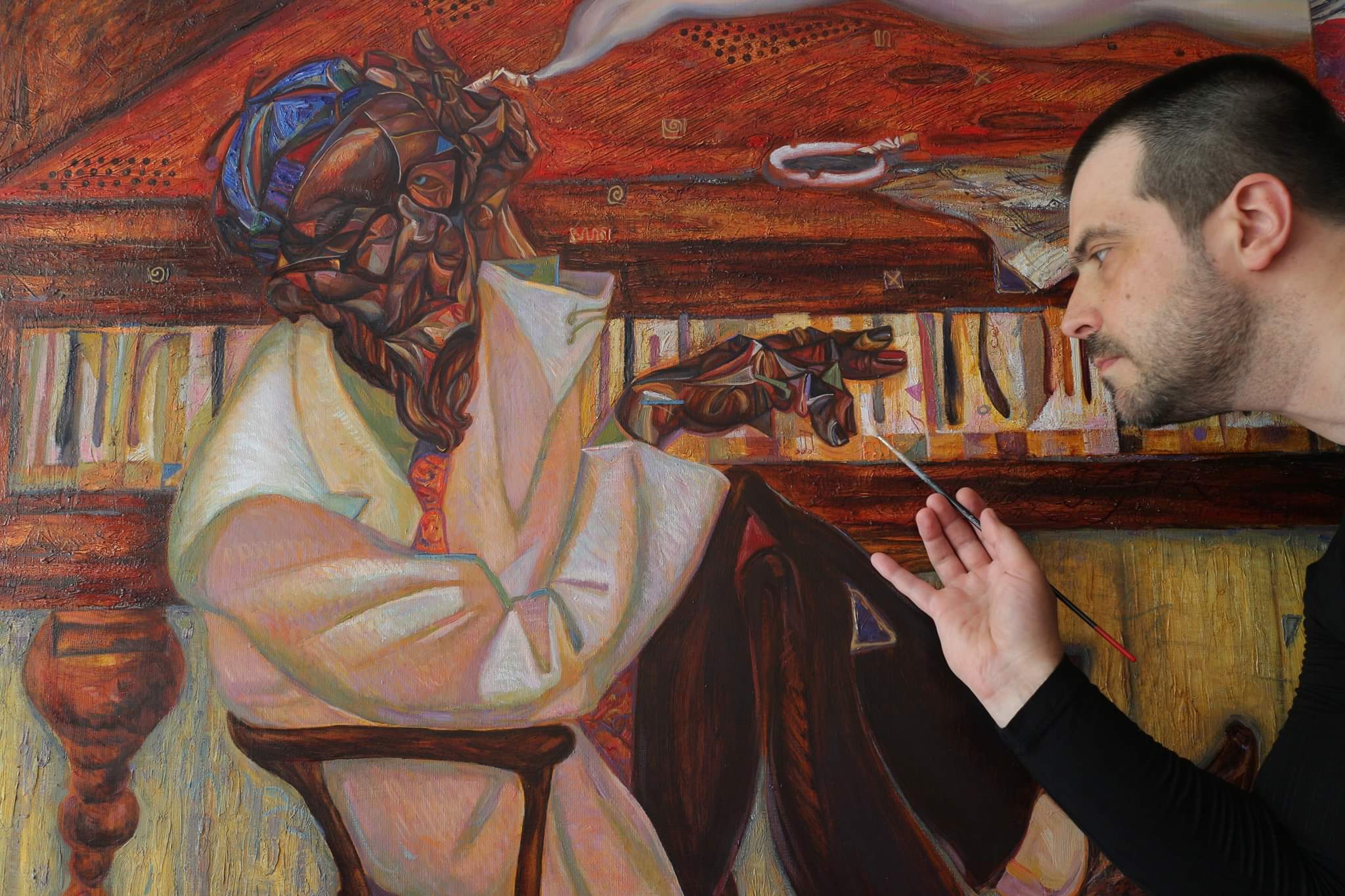 ROMAN NOGIN in process of painting