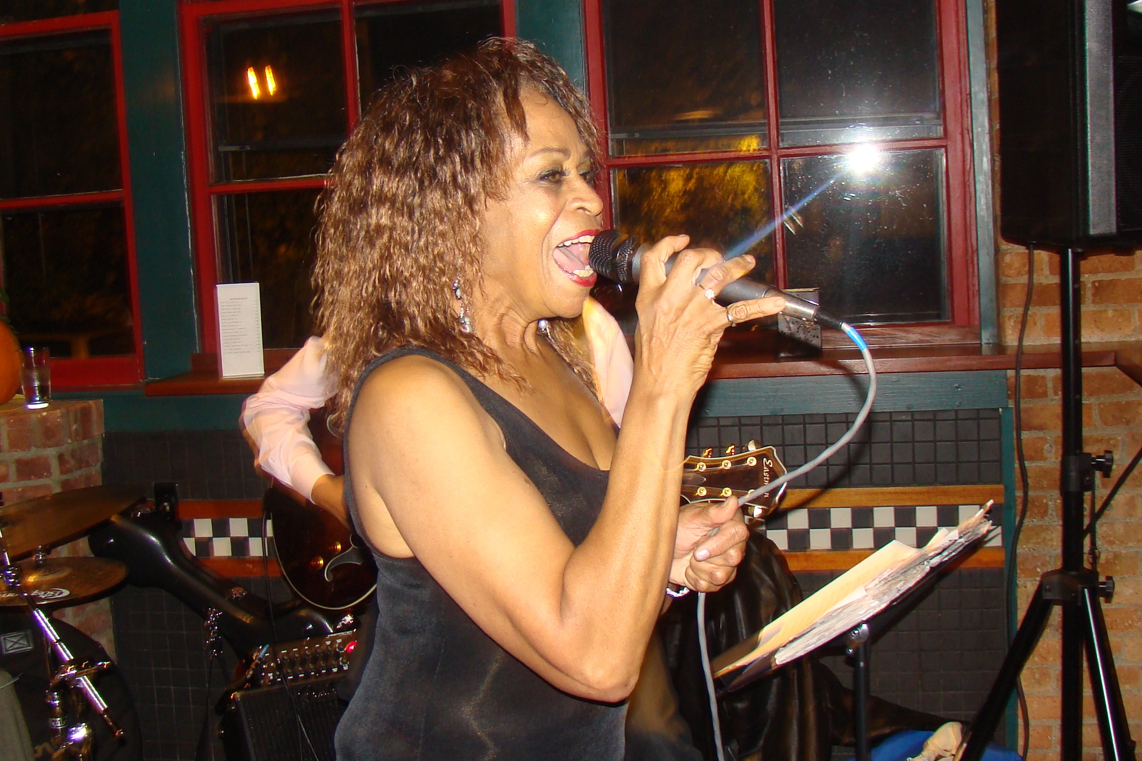 Whitney Singing at Pomodors