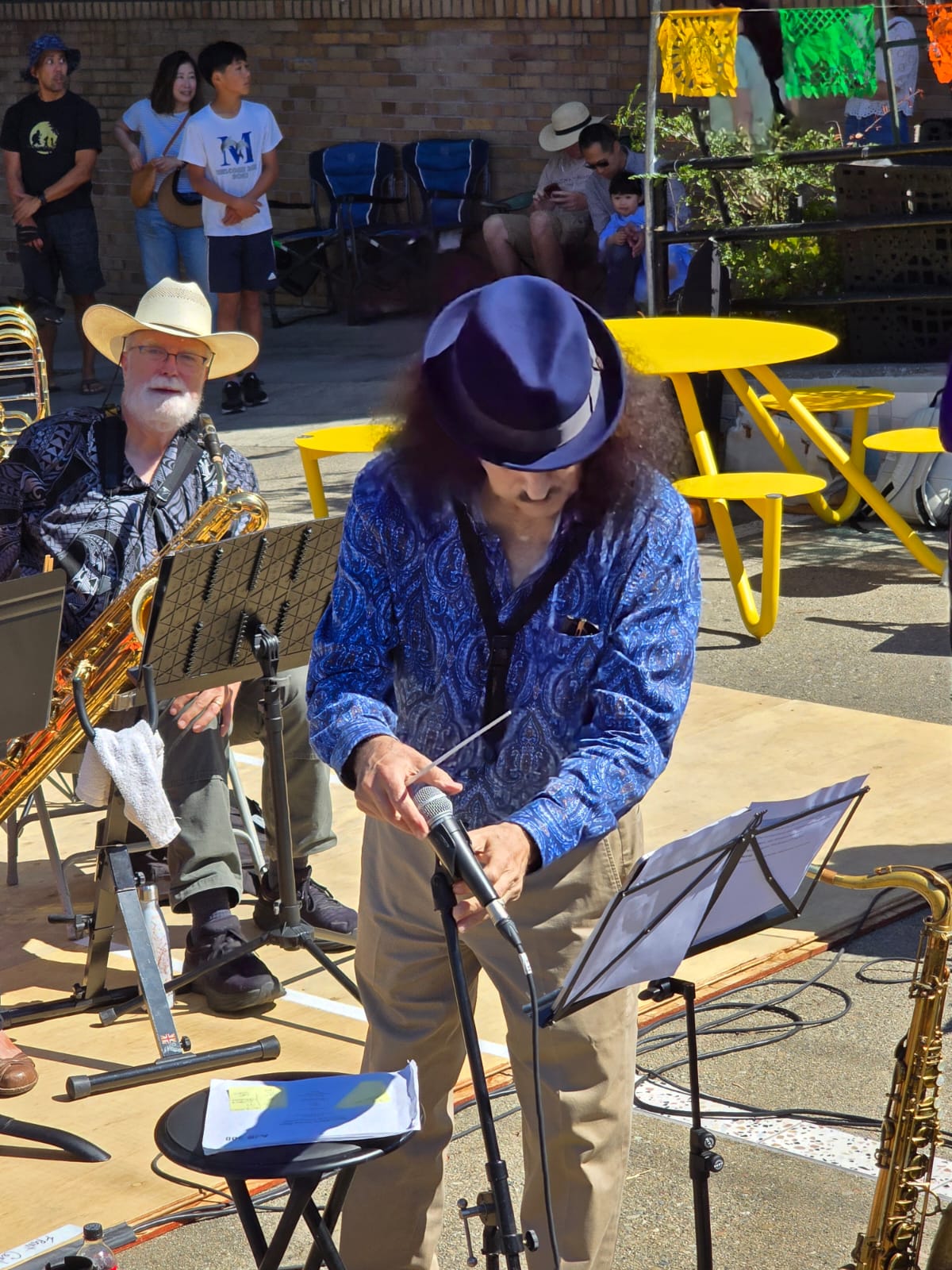 Bernard Knapp, Baritone Saxophone, in background.