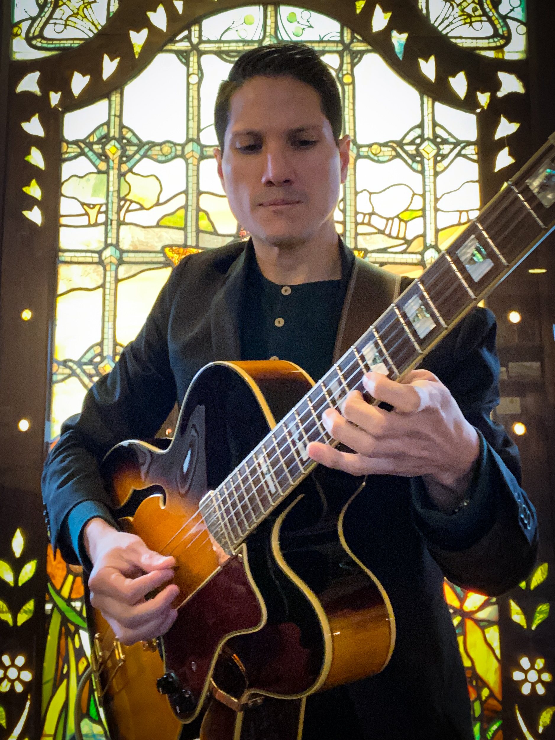 MARIO DUEÑAS, guitar
