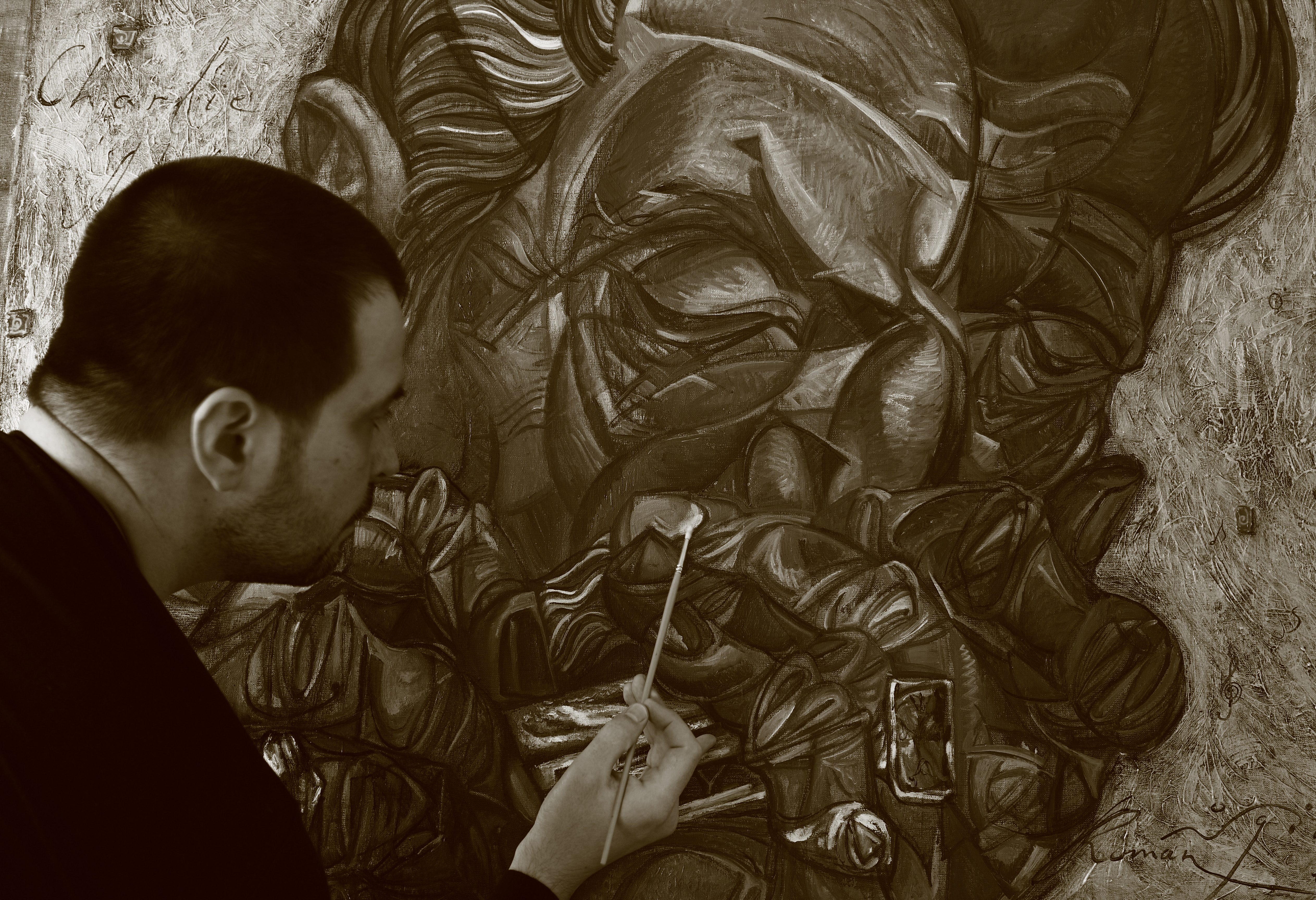 ROMAN NOGIN IN PROCESS OF PAINTING