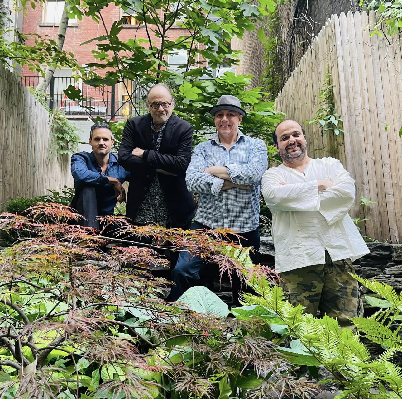 (L to R) Todd Rewoldt (sax) David Taylor (bass trombone) Robert C. Ford (poet) & Gene Pritsker (guitar) "Strength of Diversity" Song Promo