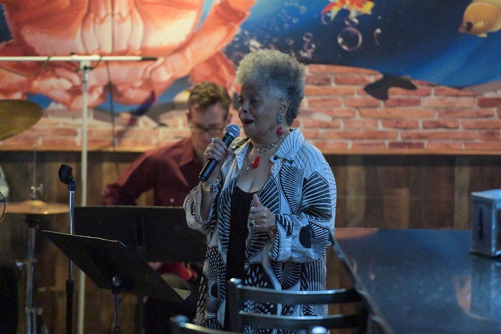 Mona Charity on vocals