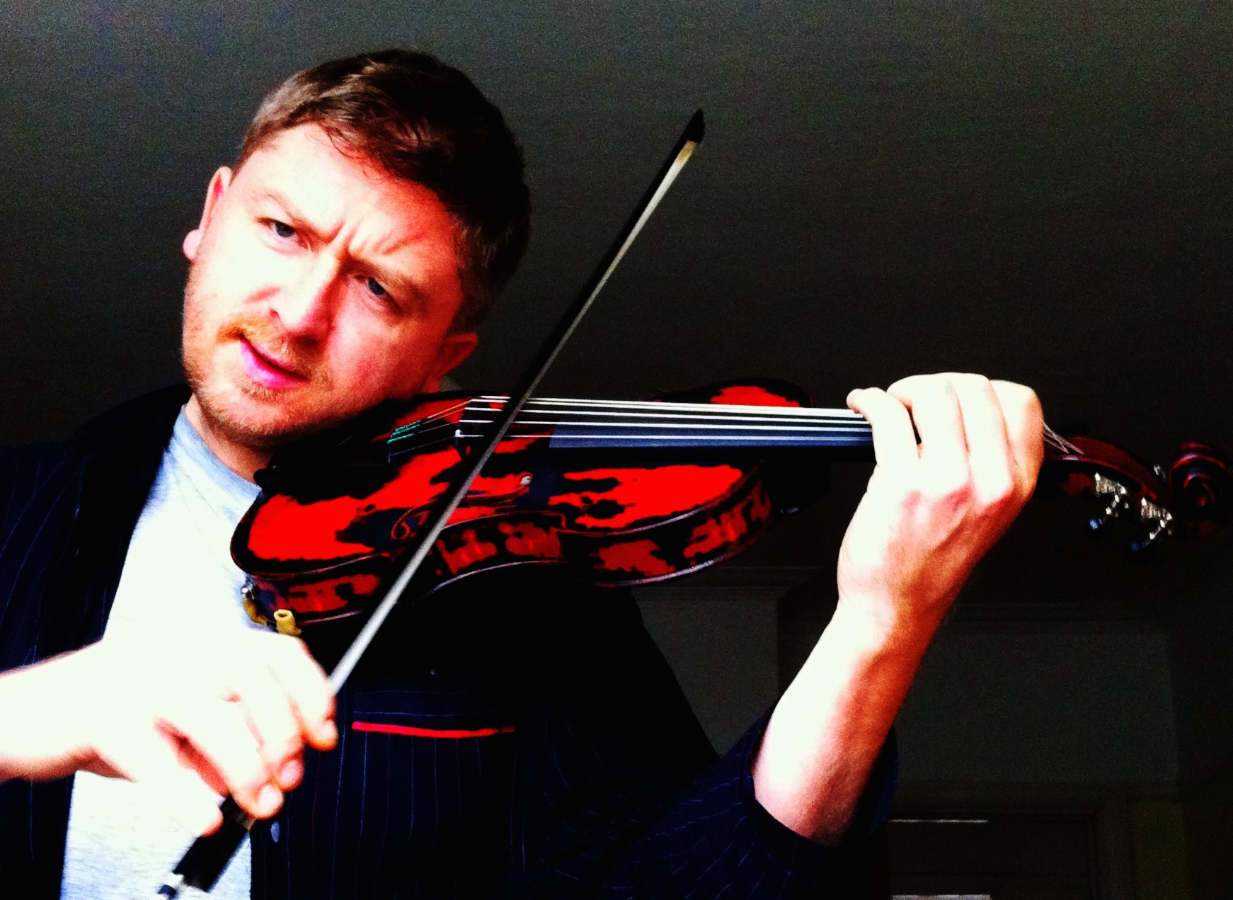 Jazz Violinist Chris Garrick with His New Neolin