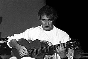 John MC Laughlin Performing in 1992 with His Trio Featuring Dominique Di Piazza on Double Bass and Trilok Gurtu on Percussion.