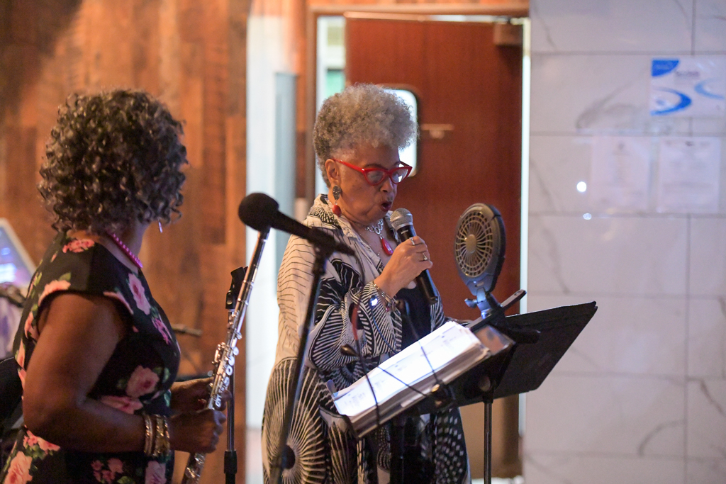 Mona Charity on vocals