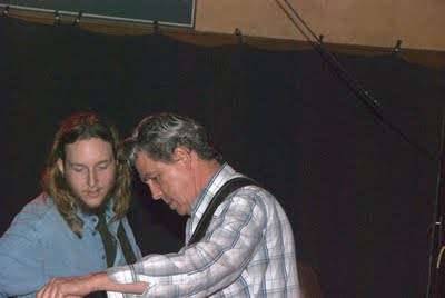 Josh Roberts and Wayne Russell Examine Bass Strings or Perhaps Are Just Admiring the Carpet Before Going On Stage — jazz photo by I55 Productions | All About Jazz