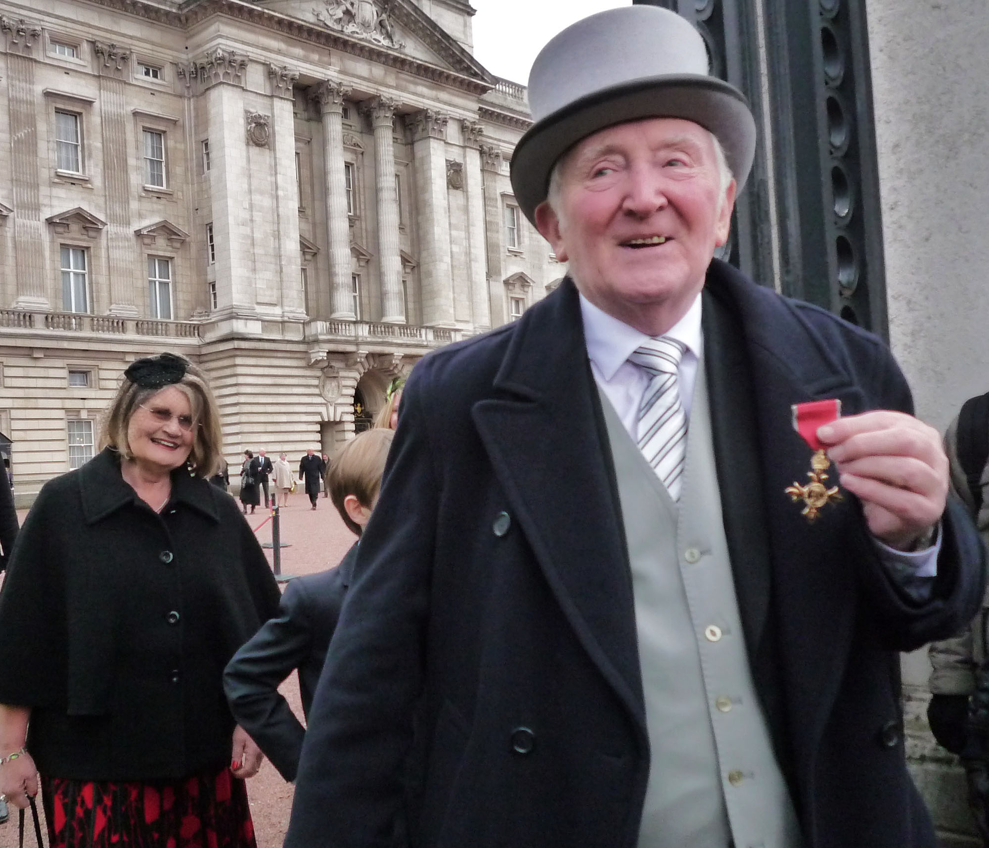 Bill Ashton with the Obe Award