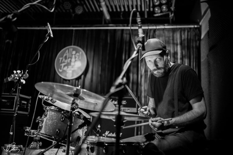 Mikkel Hess playing drums far away from home