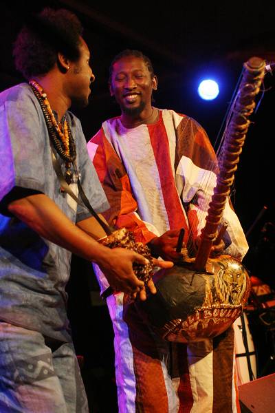 Kara and Laou Kayate with "Kara" at the Sud Des Alpes, Amr, Geneva, Switzerland, March 2006