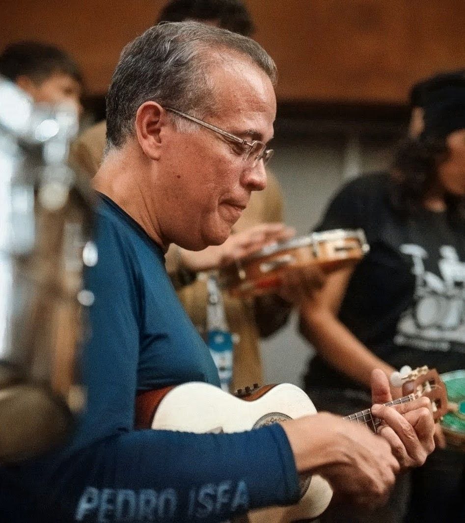 Playing Cavaquinho en El Sistema — jazz photo by Pedro Isea Herrera | All About Jazz