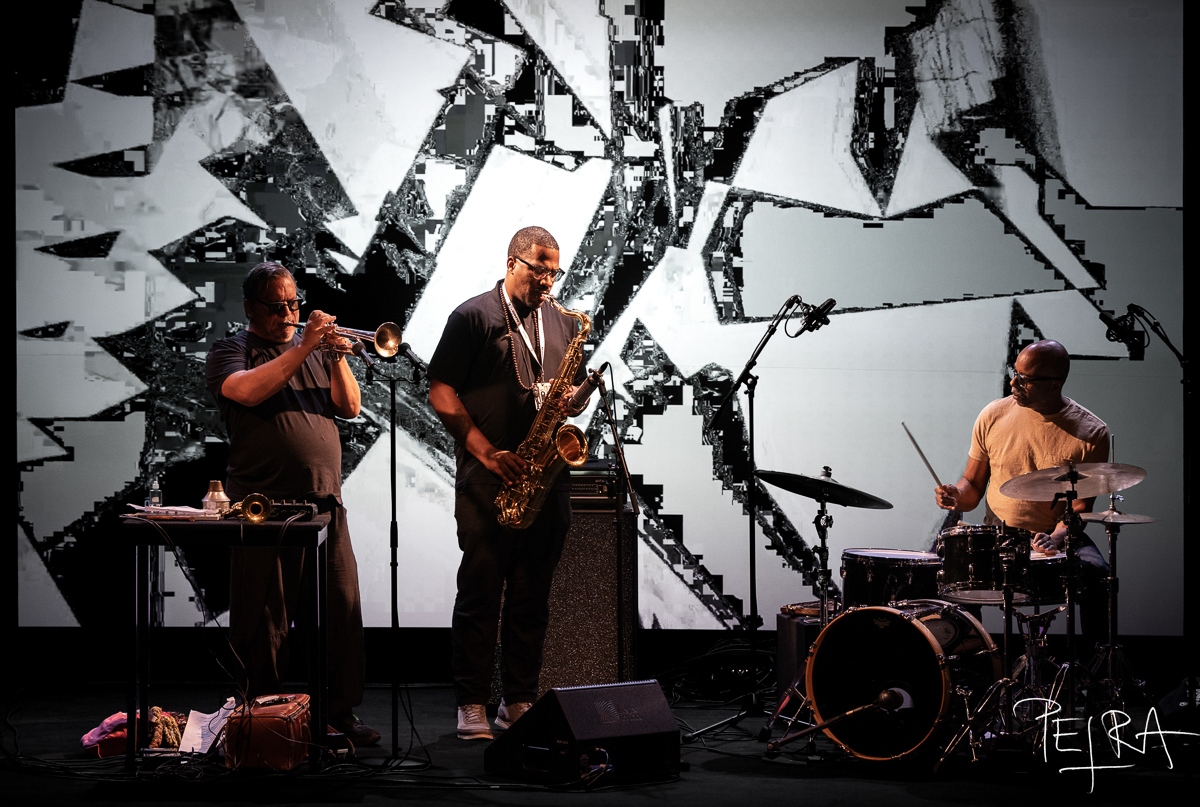Chicago Underground Duo Hyperglyph, Chad Taylor, Rob Mazurek, James Brandon Lewis — jazz photo by Petra Cvelbar | All About Jazz