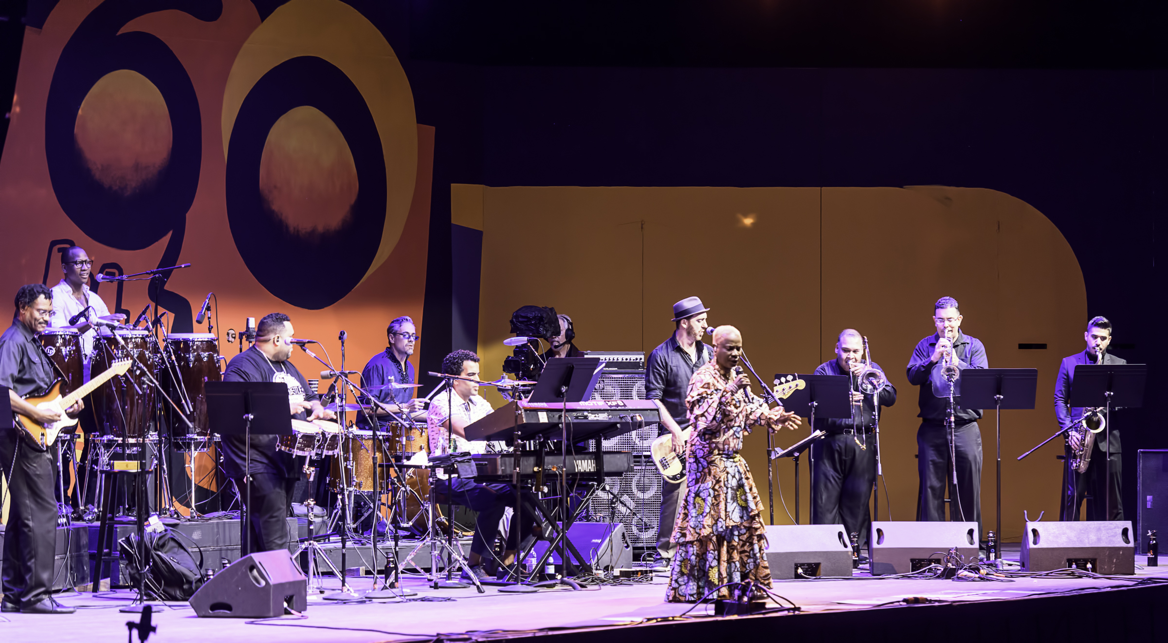 Dominic James, Jhair Sala, Edgardo Yaya Serka, Edgar Pantoja, Pedrito Martinez, Ben Zwerin, Humberto Ruiz, Brian Beukelman and Fabian Chavez with Angelique Kidjo's Tribute to Salsa at the Monterey Jazz Festival