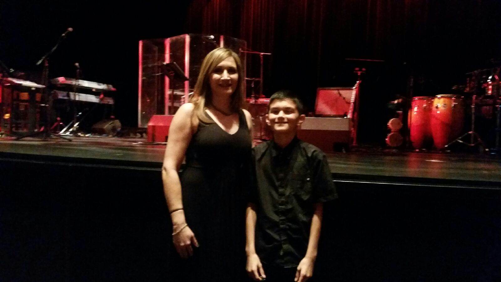 Isaac and mom before the show