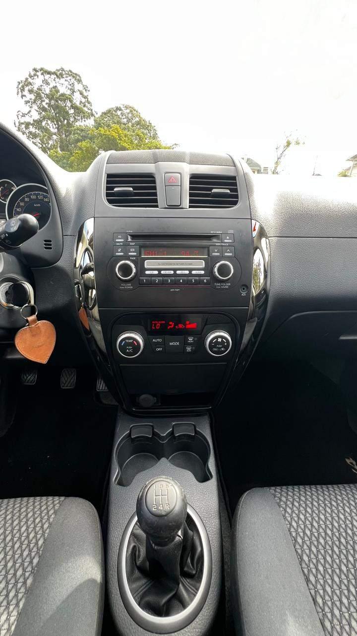 Foto numero 24 do veiculo Suzuki SX4 2.0 16V 145cv 4WD 5p Mec.  - Preta - 2012/2013