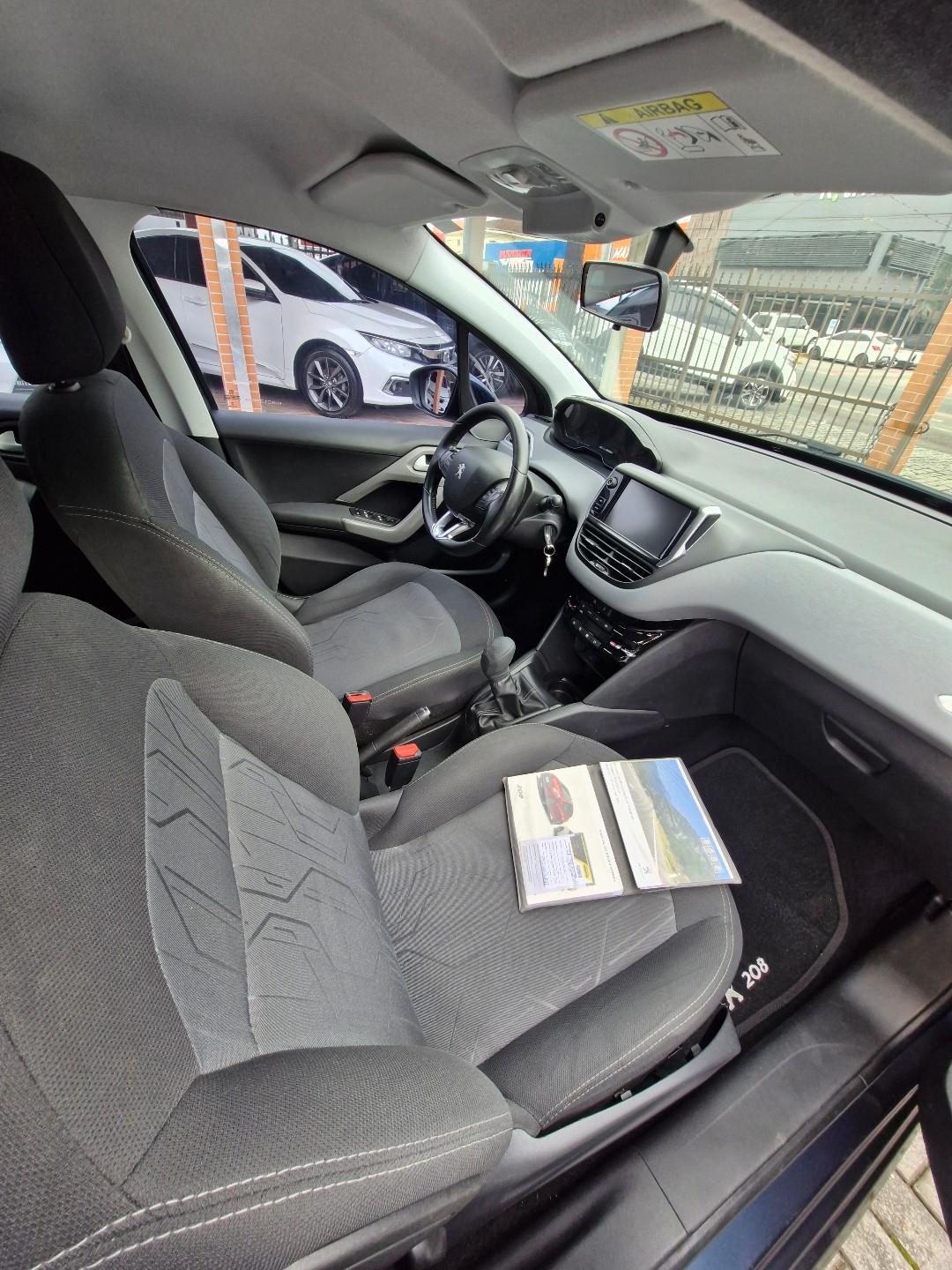 Foto numero 17 do veiculo Peugeot 208 Active Pack 1.2 Flex 12V 5p Mec.  - Azul - 2016/2017