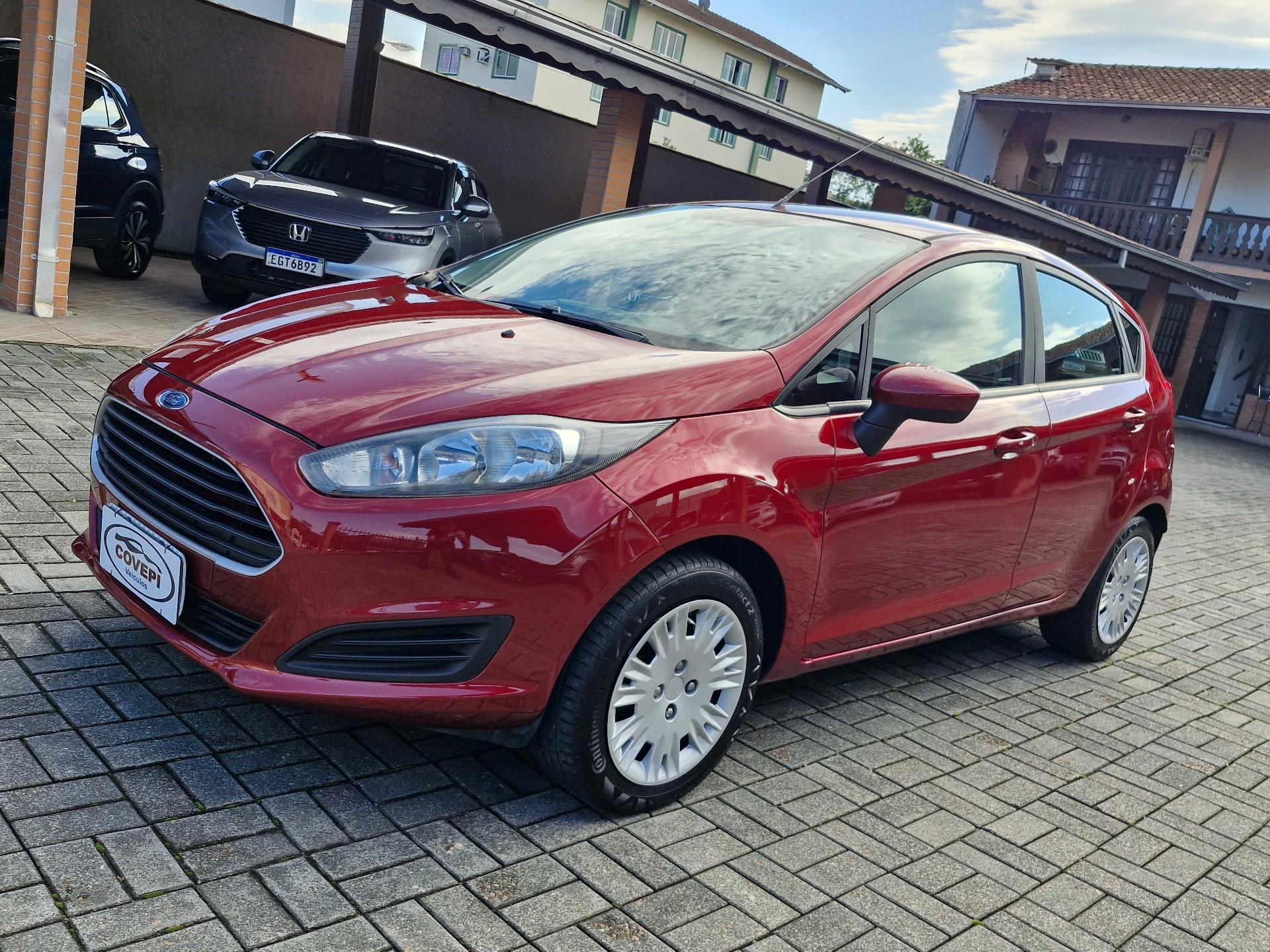 Foto numero 1 do veiculo Ford Fiesta 1.5 16V Flex Mec. 5p  - Vermelha - 2015/2016