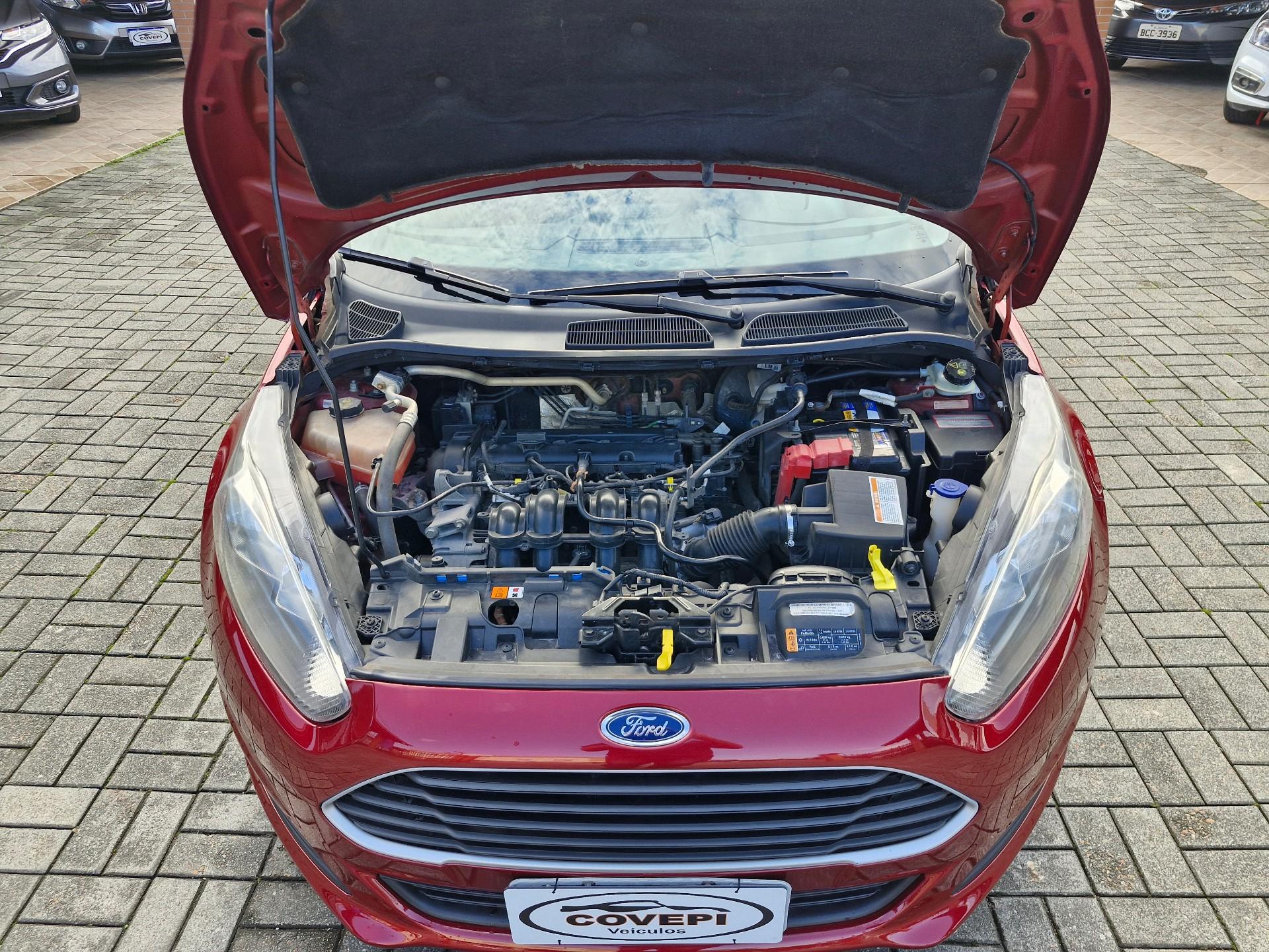 Foto numero 7 do veiculo Ford Fiesta 1.5 16V Flex Mec. 5p  - Vermelha - 2015/2016