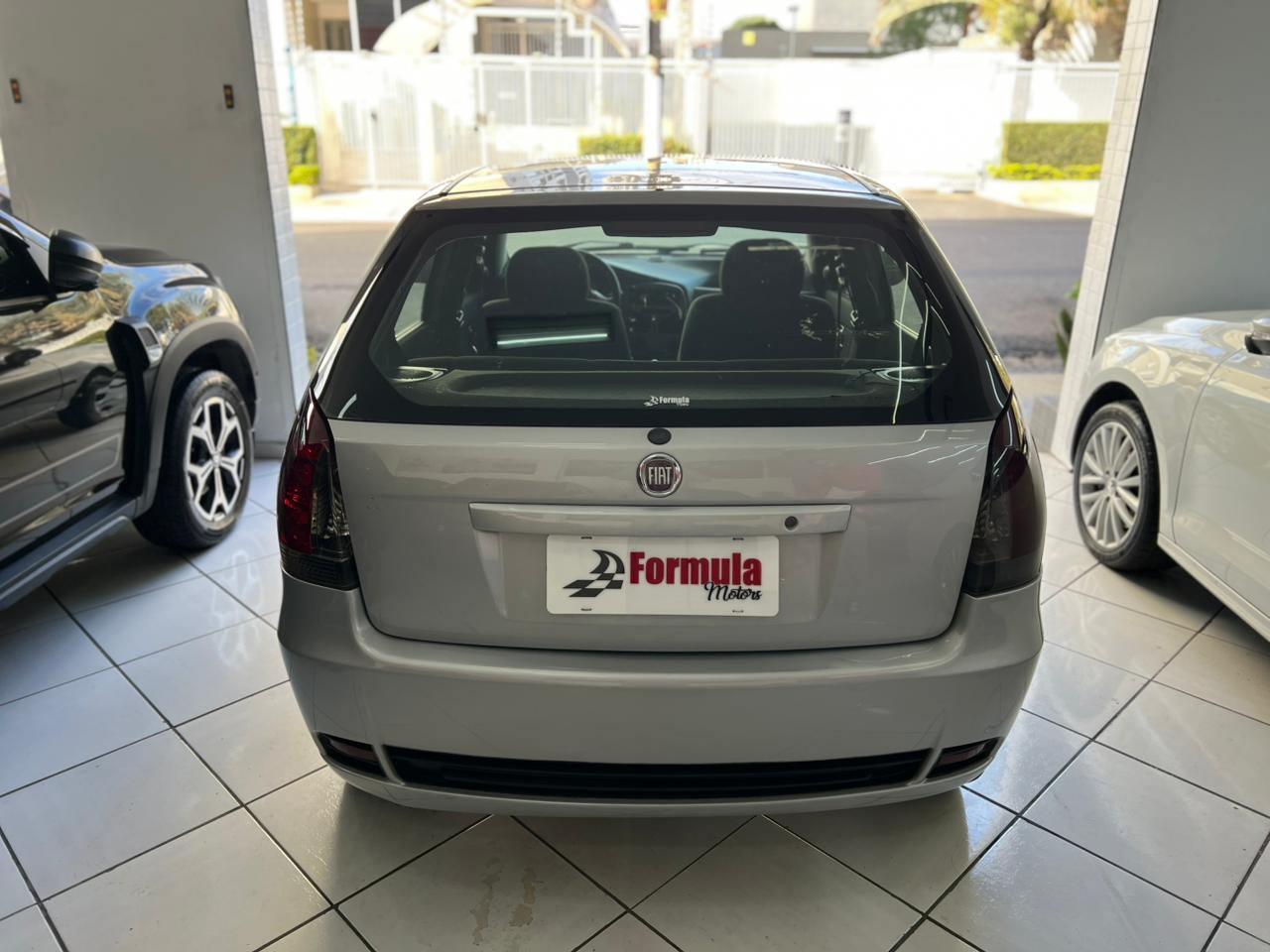 Foto numero 15 do veiculo Fiat Palio 1.0 ECONOMY Fire Flex 8V 4p  - Prata - 2012/2013