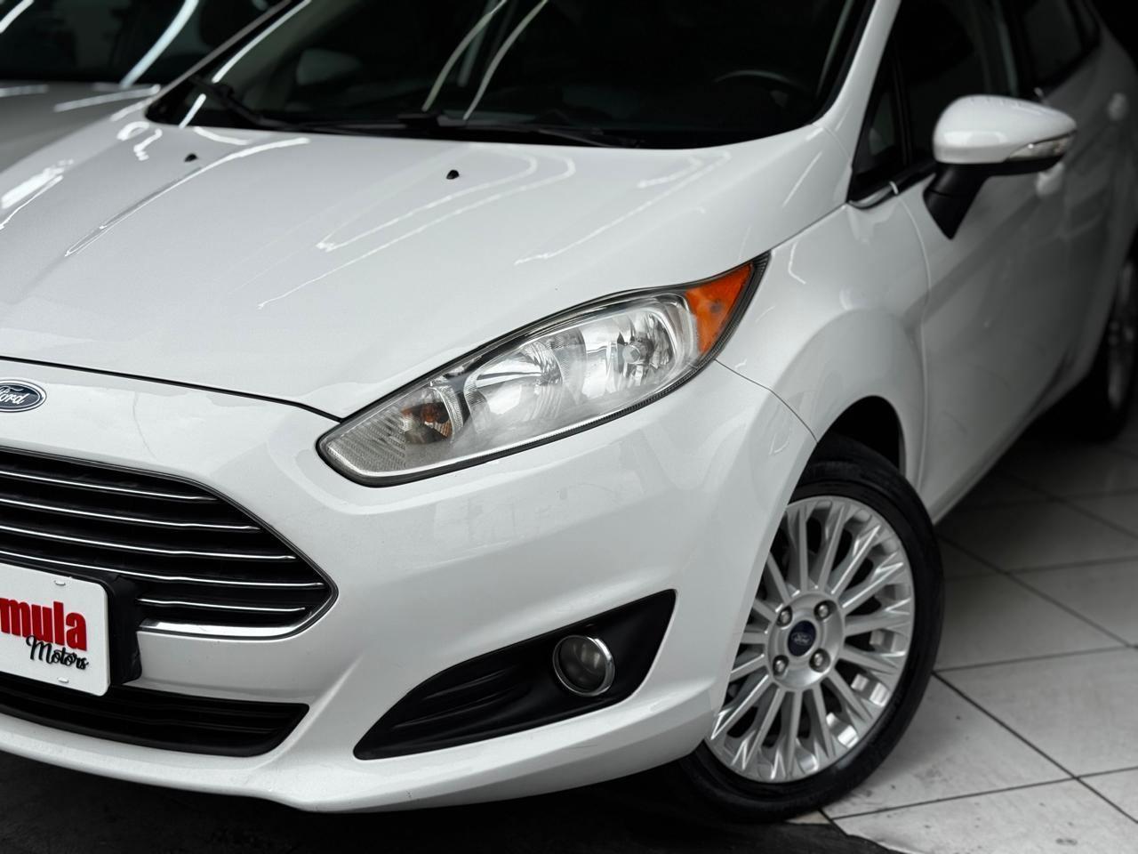 Foto numero 16 do veiculo Ford Fiesta Sed. TI./TI.Plus1.6 16V Flex Aut.  - Branca - 2014/2014