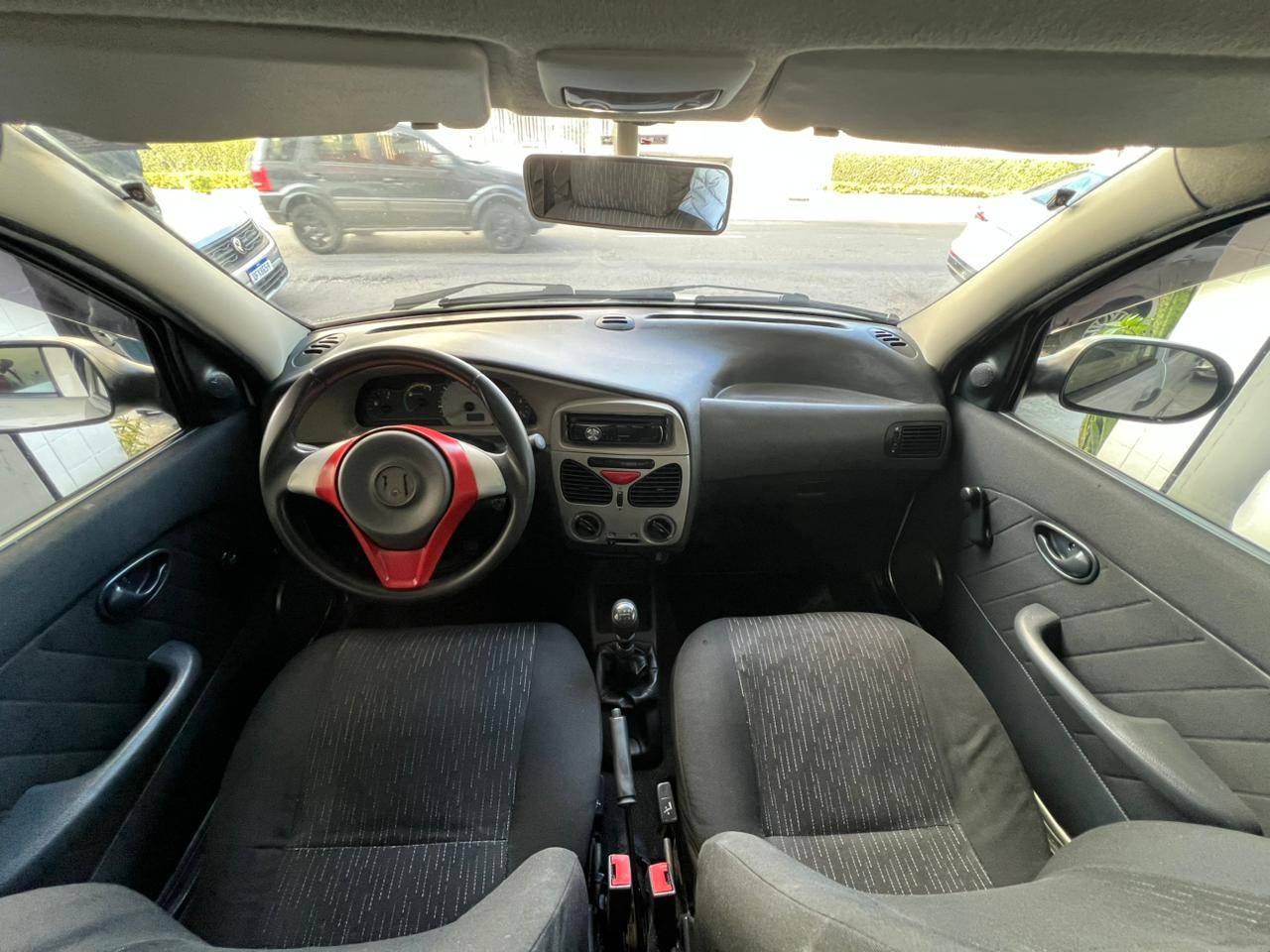 Foto numero 3 do veiculo Fiat Palio 1.0 ECONOMY Fire Flex 8V 4p  - Prata - 2012/2013
