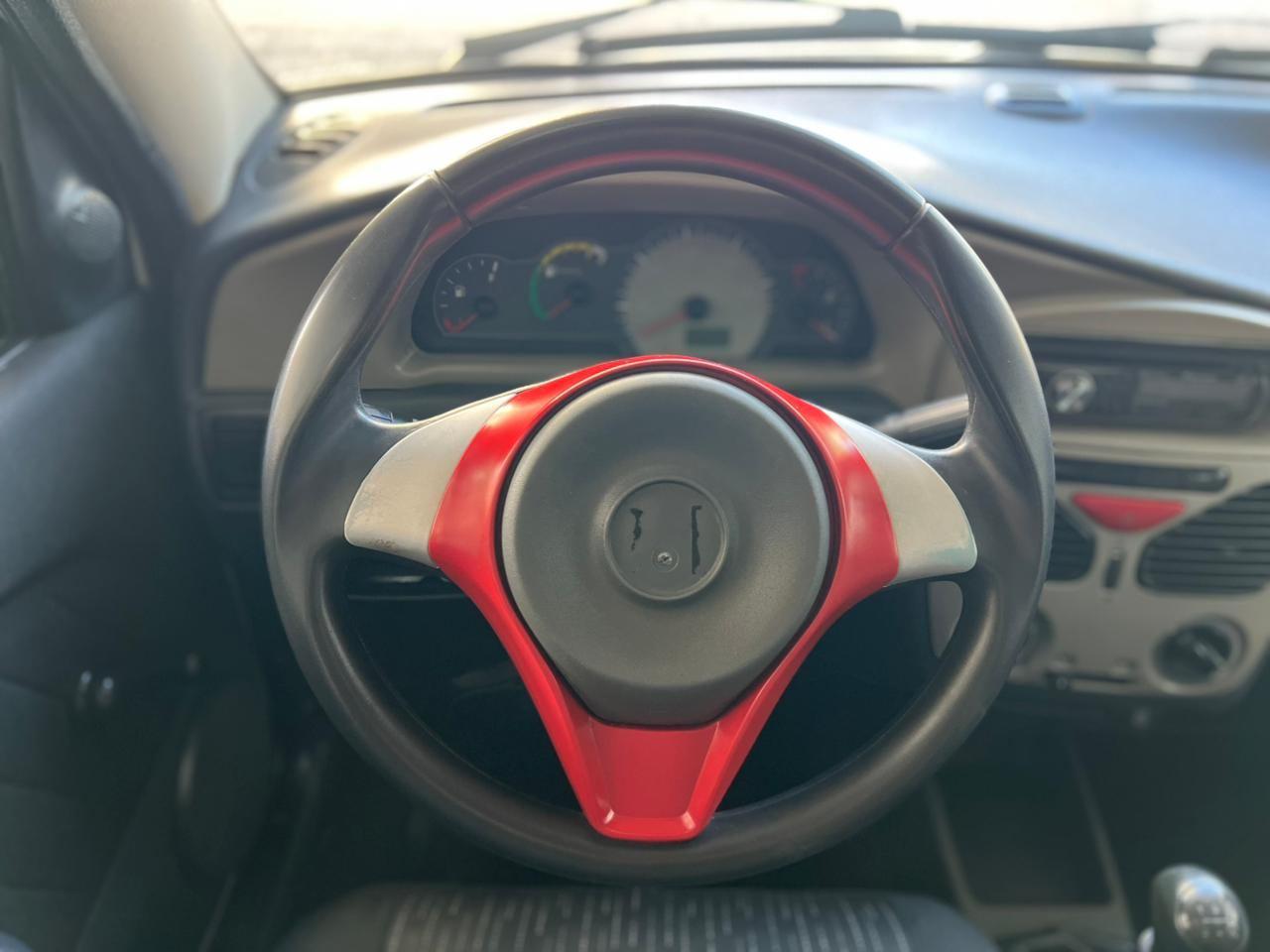 Foto numero 6 do veiculo Fiat Palio 1.0 ECONOMY Fire Flex 8V 4p  - Prata - 2012/2013