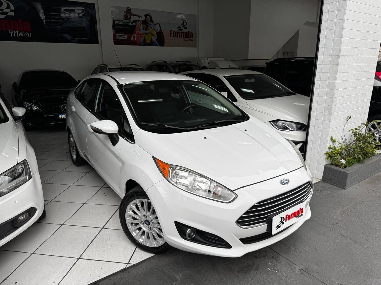 Foto numero 14 do veiculo Ford Fiesta Sed. TI./TI.Plus1.6 16V Flex Aut.  - Branca - 2014/2014