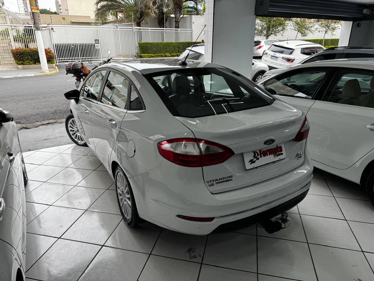 Foto numero 17 do veiculo Ford Fiesta Sed. TI./TI.Plus1.6 16V Flex Aut.  - Branca - 2014/2014