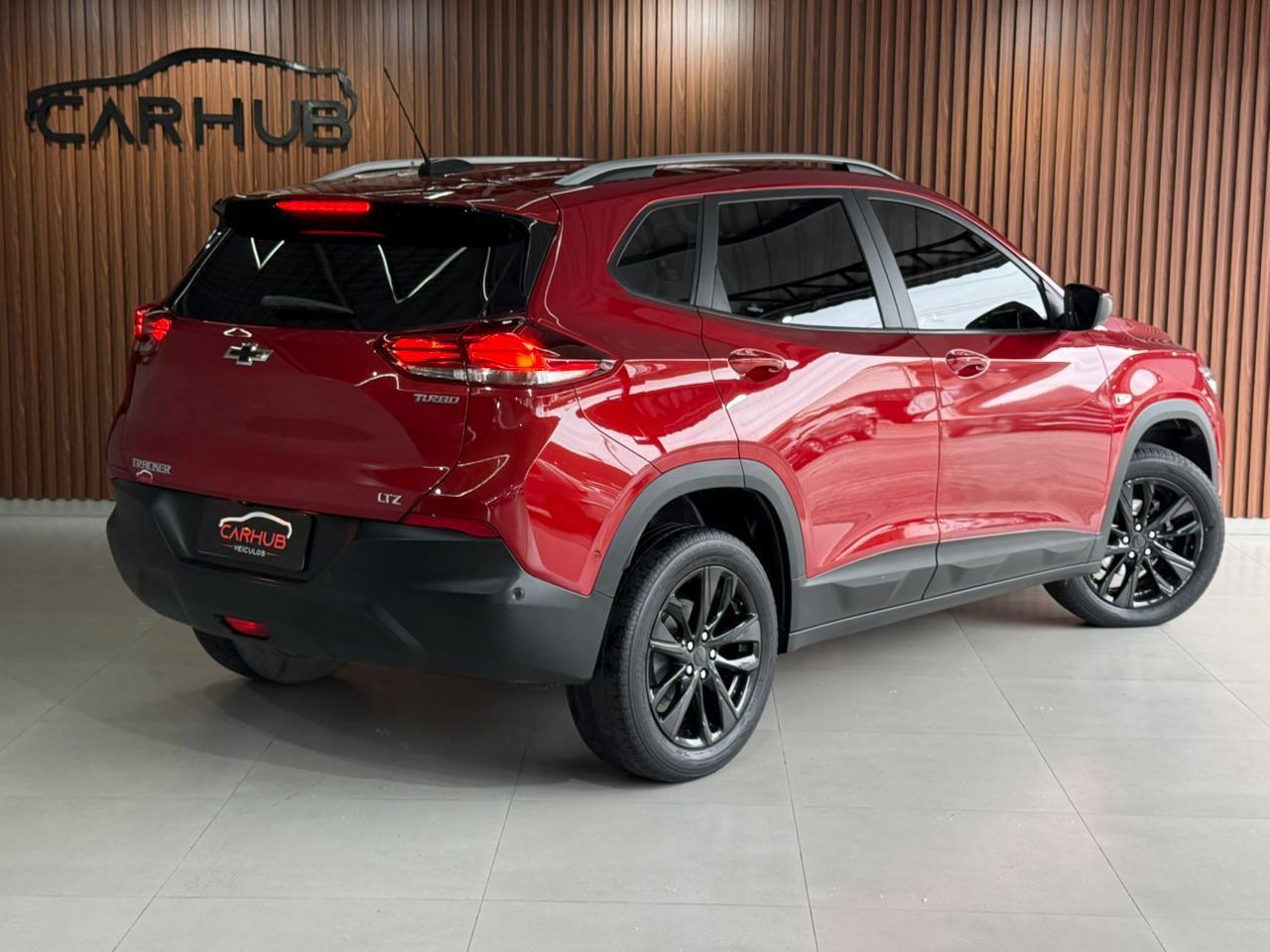 Foto numero 3 do veiculo Chevrolet Tracker HEV/ T A LTZ - Vermelha - 2020/2021