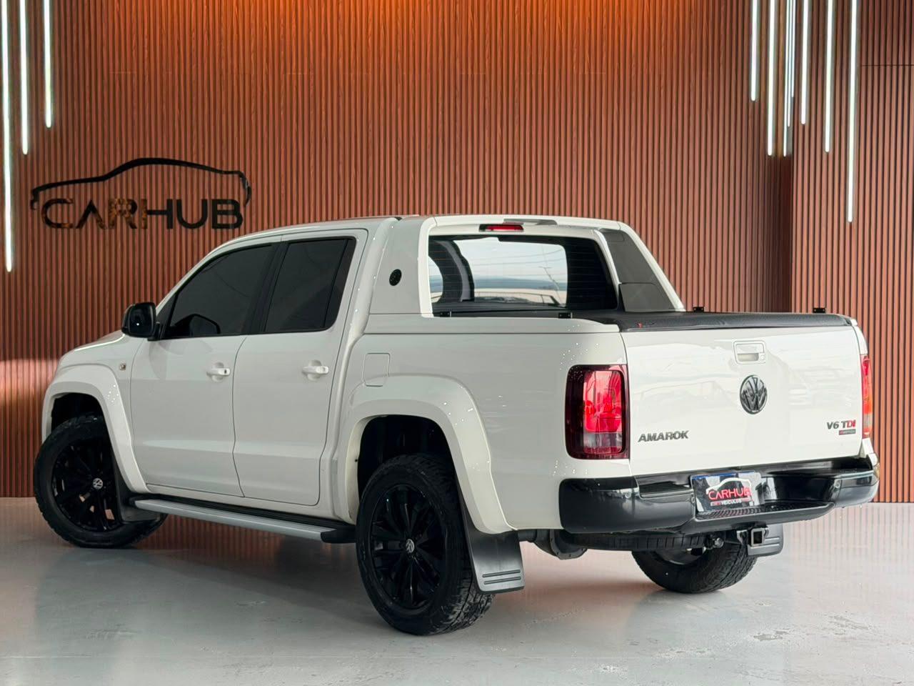 Foto numero 2 do veiculo Volkswagen Amarok /VW  V6 EXTR AC4 - Branca - 2018/2019