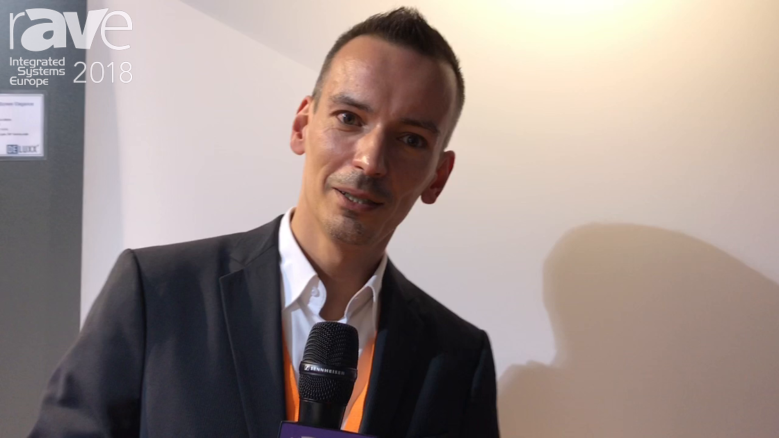 ISE 2018: De Luxx Demos Cinema Electric Tension ALR Screen with a Short Throw Projector