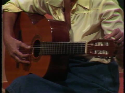 thumbnail of Folk Guitar; 15, 16