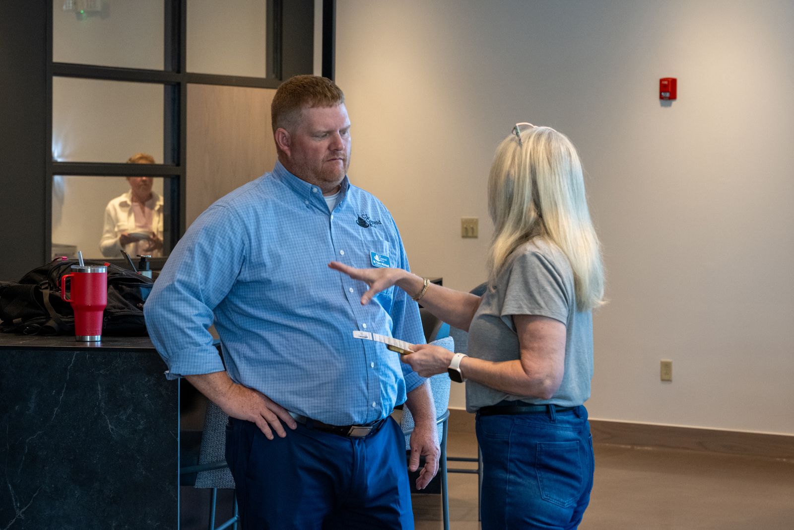Two attendees in discussion