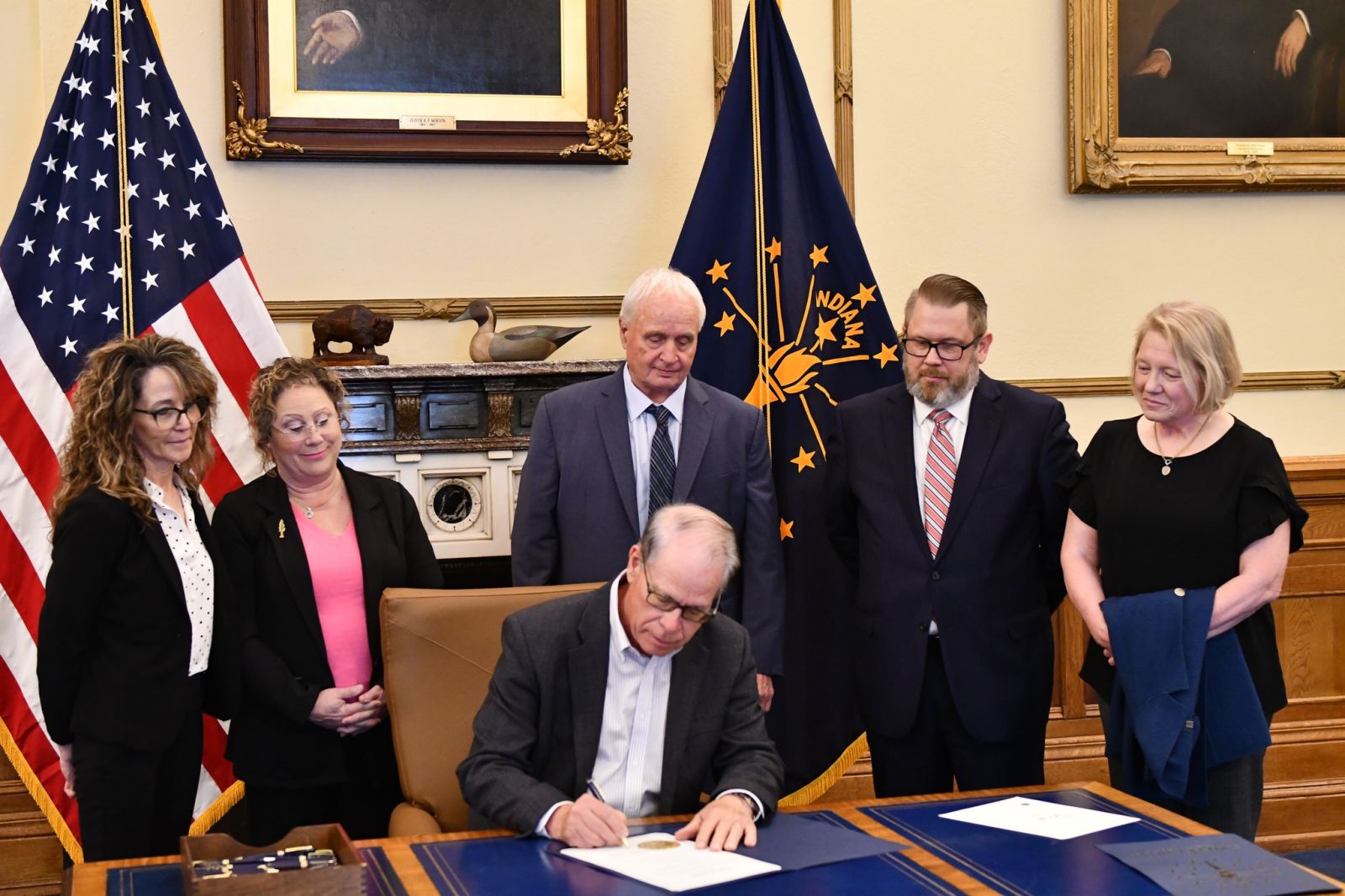 Governor Braun signing SEA 270 with Senator Rick Niemeyer and ITA leadership