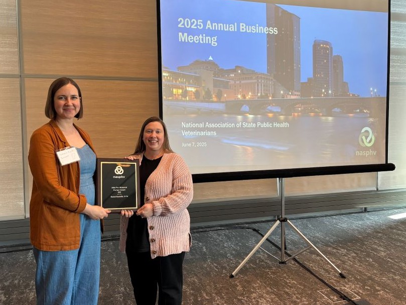 Dr. Rachel Radcliffe receiving the John Poe Memorial Partner Award at the 2025 NAPSHV annual business meeting
