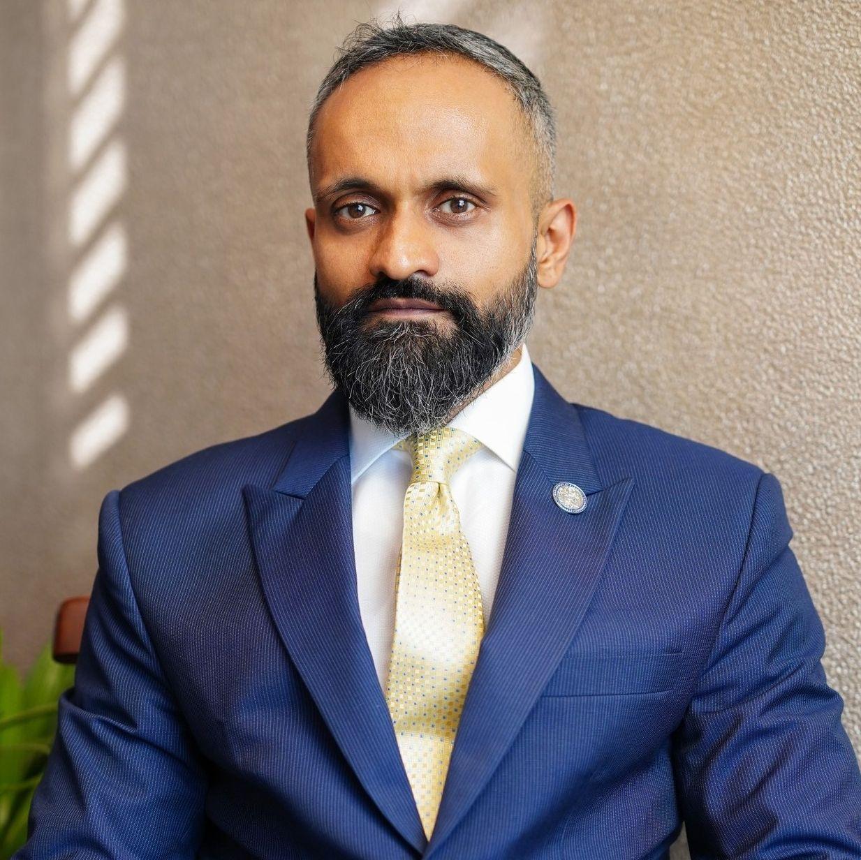 Dr. LEON ALEXANDER