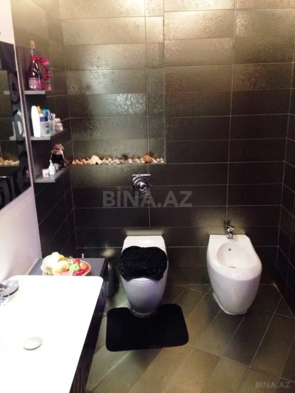 Satılır 5 otaqlı mənzil 300 m²