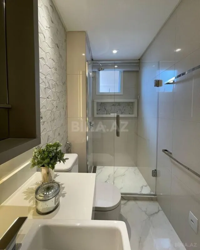 Satılır 4 otaqlı mənzil 210 m²