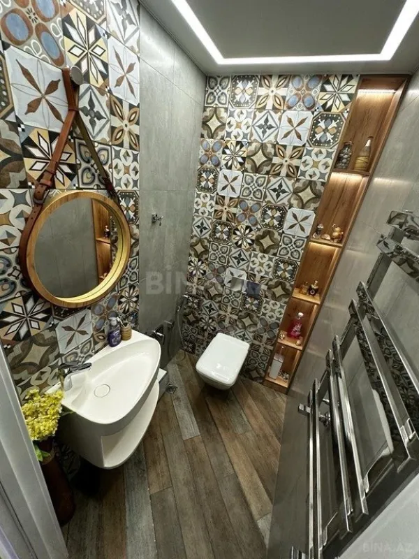 Satılır 3 otaqlı mənzil 133 m²