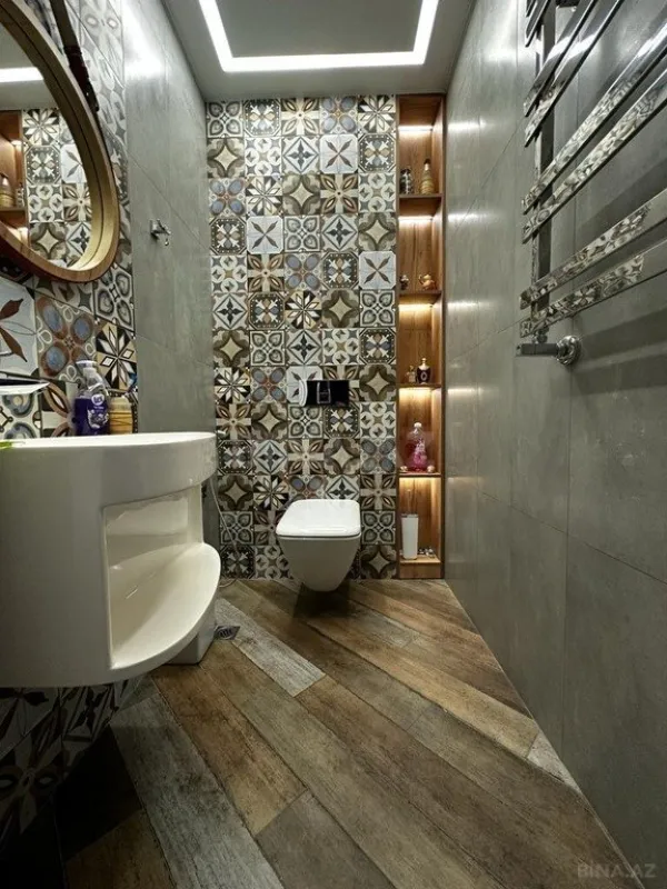 Satılır 3 otaqlı mənzil 133 m²