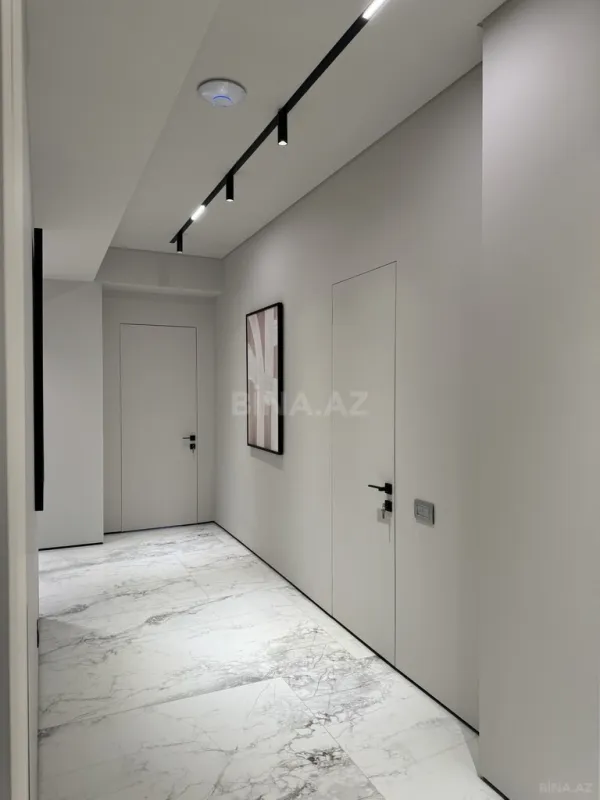 Satılır 4 otaqlı mənzil 155 m²