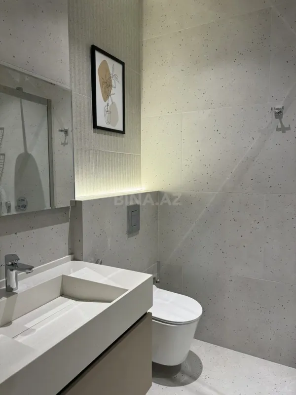 Satılır 4 otaqlı mənzil 155 m²