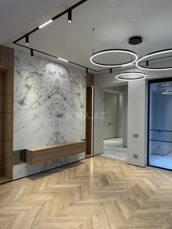 Satılır 4 otaqlı mənzil 155 m²